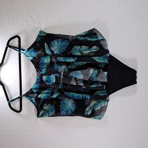 3XL one piece with mesh overlay. NWOT. Adjustable straps and removable bra pads.